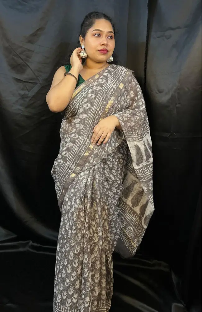 Close-up of grey Kota Doria saree motifs