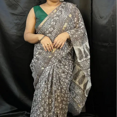 Lightweight handloom Kota cotton saree draped elegantly