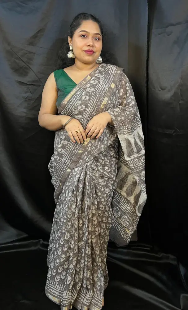 Lightweight handloom Kota cotton saree draped elegantly