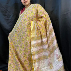 Elegant Kota Doria handloom saree in pastel Yellow – festive styling with jewelry