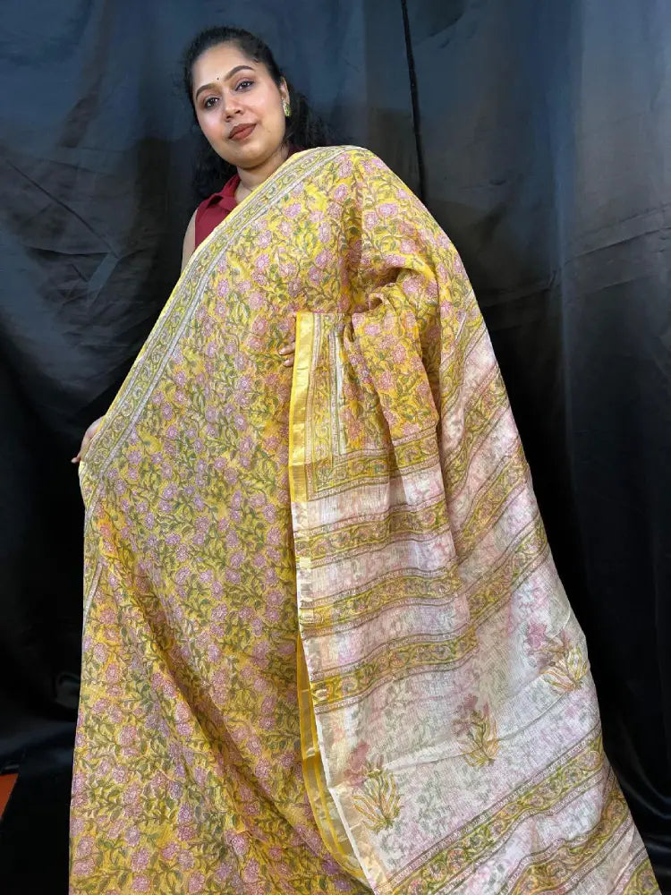 Elegant Kota Doria handloom saree in pastel Yellow – festive styling with jewelry