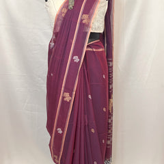 Baluchari handloom saree in peacock purple cotton featuring woven motifs inspired by Indian heritage.
