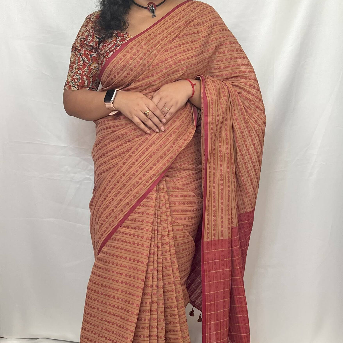 Full view of beige colour cotton handloom saree with blouse piece.