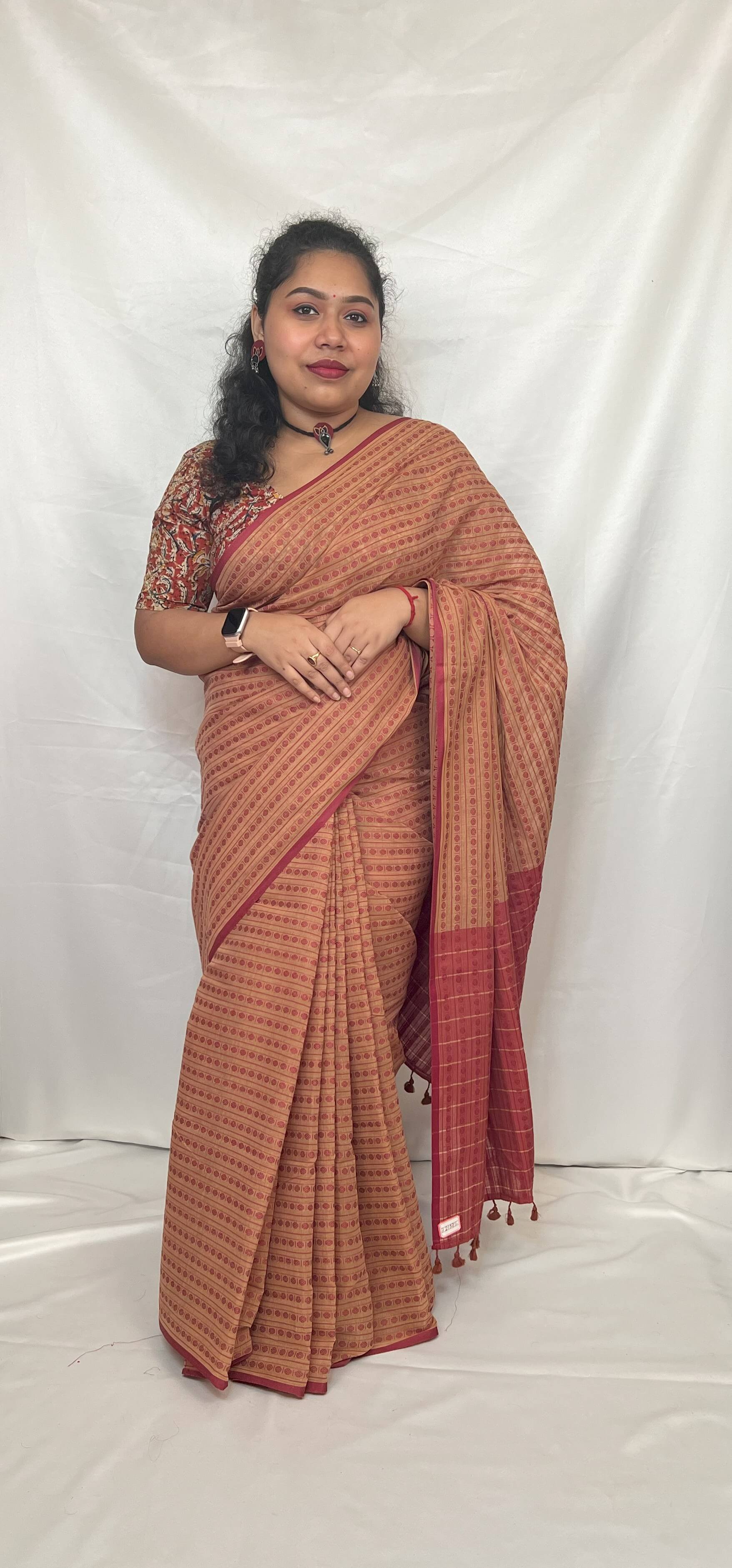 Full view of beige colour cotton handloom saree with blouse piece.