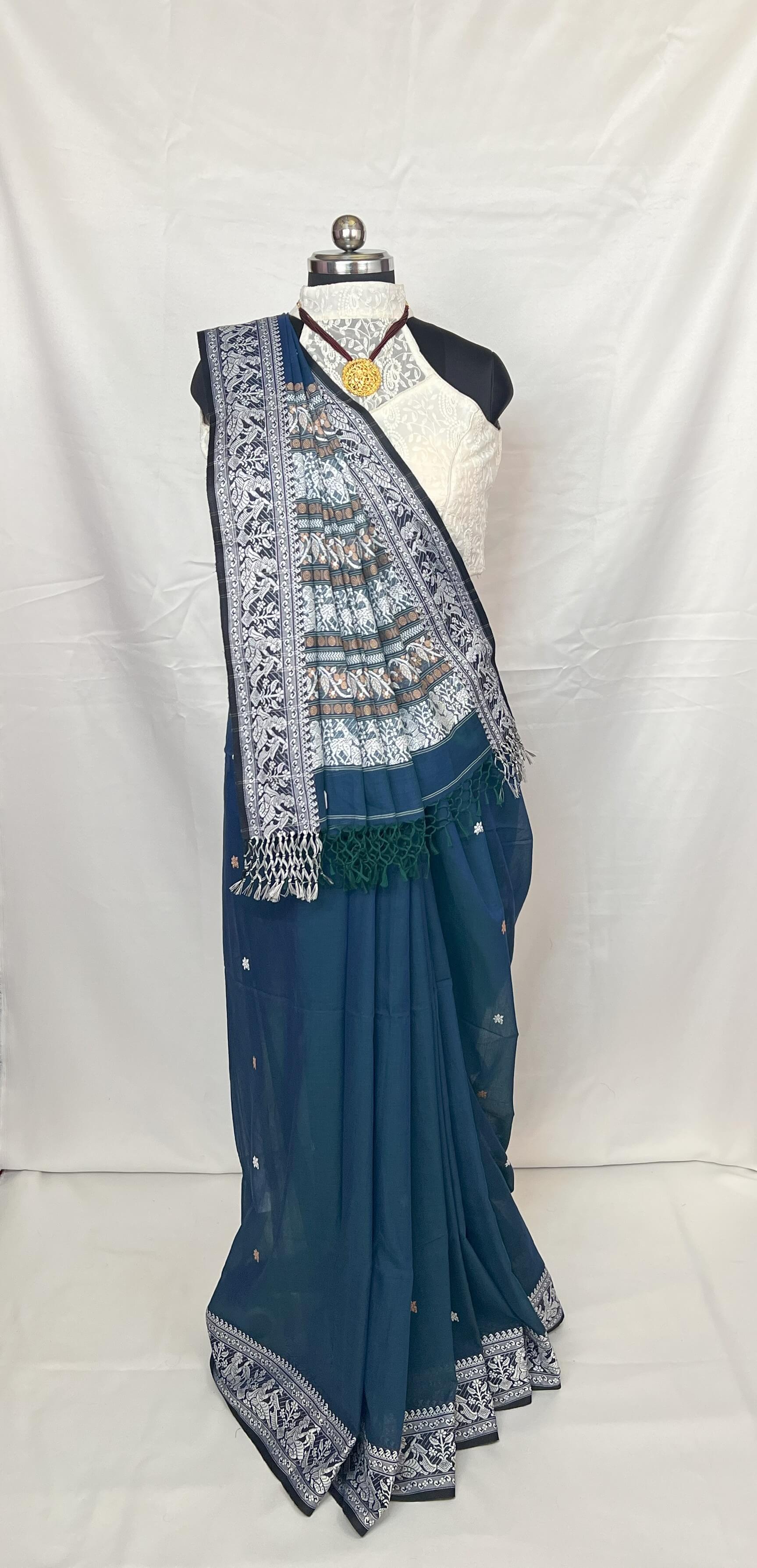 Authentic Bengal handloom Baluchari saree in peacock blue cotton with fine pallu design.