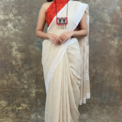 Bengali handloom tussar saree in white, styled for Sindoor Khela during Durga Puja.