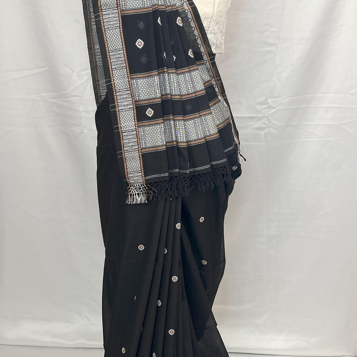Traditional handloom cotton saree in black with fine weaving details
