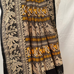 Cotton Baluchari Saree – Draping style showing black handloom fabric.