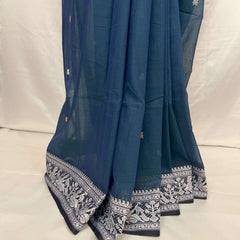Designer Baluchari saree in peacock blue cotton showcasing Bengal weaving heritage.
