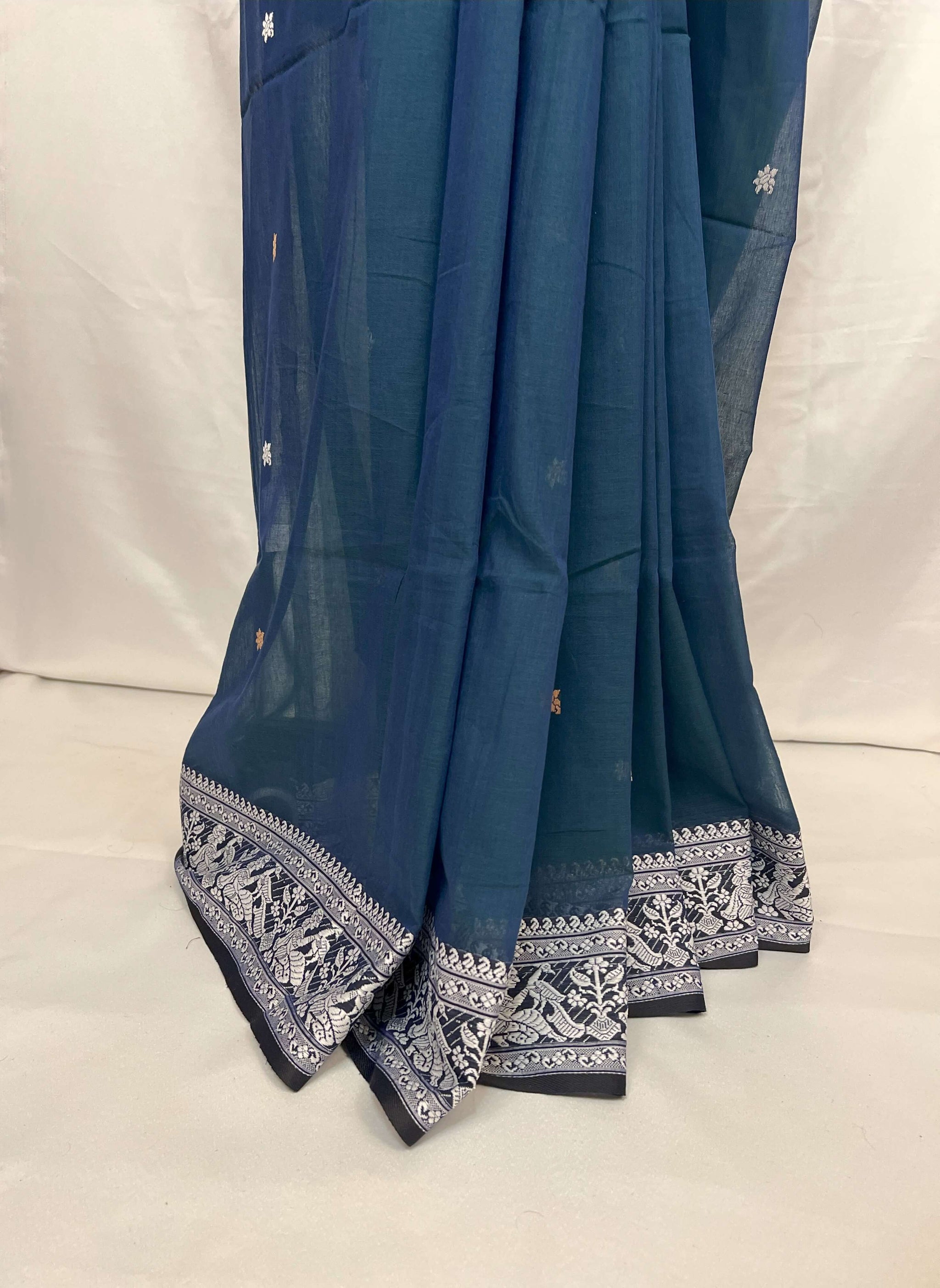 Designer Baluchari saree in peacock blue cotton showcasing Bengal weaving heritage.