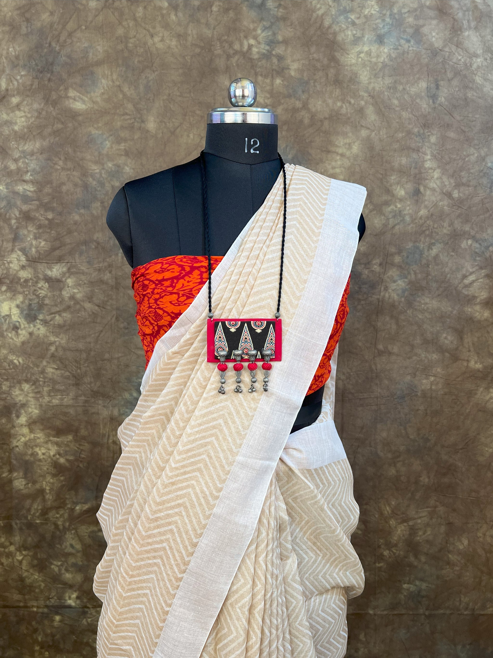 Festive tussar silk saree in  white for Navratri and Durga Puja celebrations.