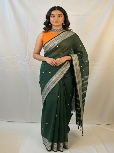 Elegant green handloom saree styled for Diwali celebration.