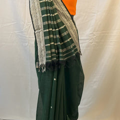 Sustainable handloom green cotton saree for festive gatherings.