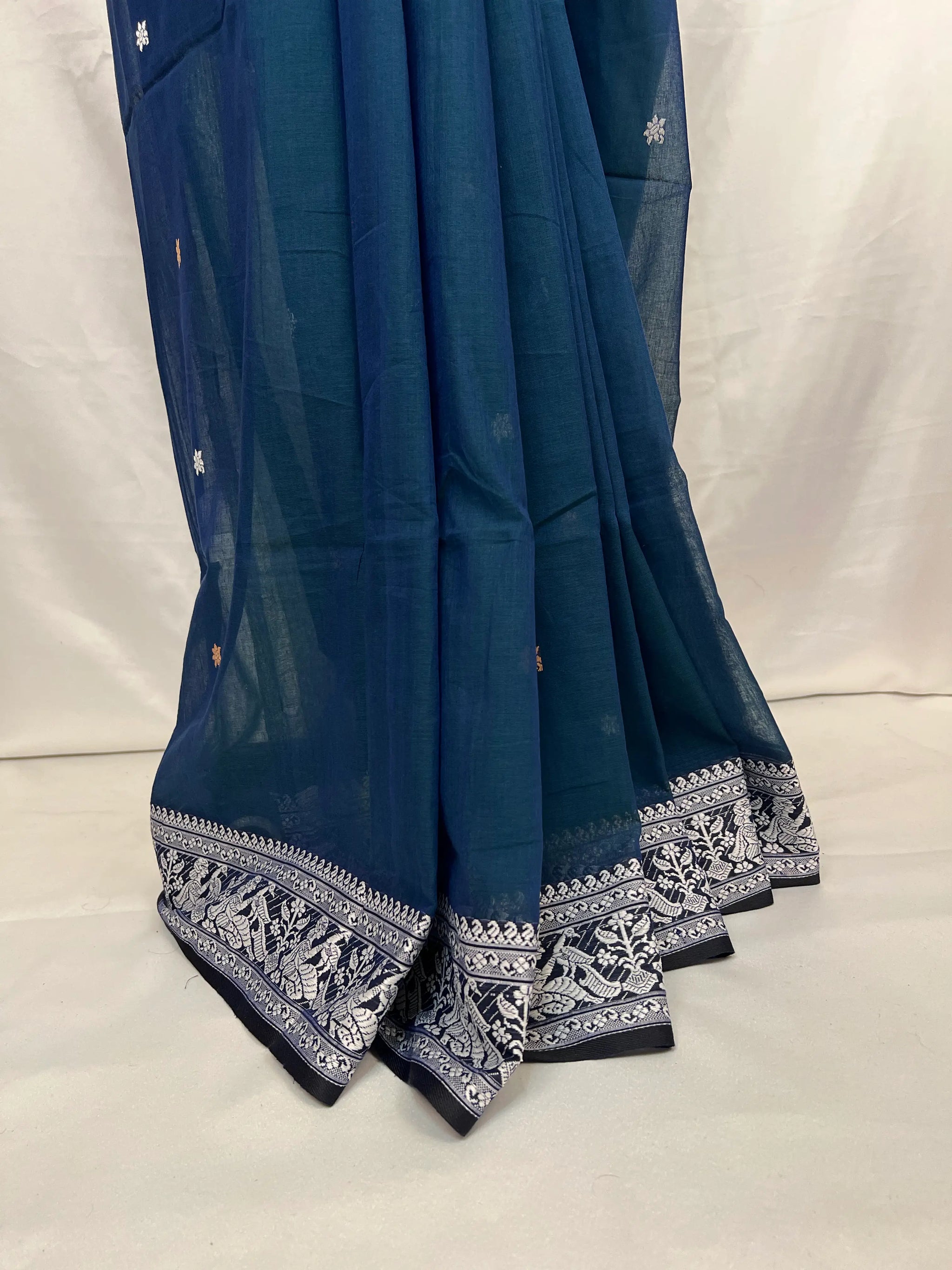 Indian handloom Baluchari saree in peacock blue cotton, perfect for festive and wedding wear.