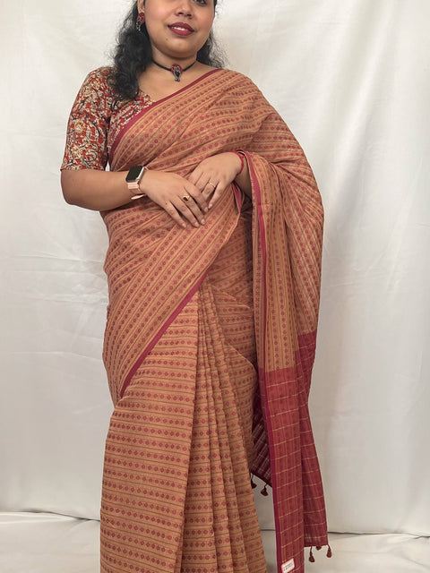 Lightweight beige handloom saree perfect for summer wear.