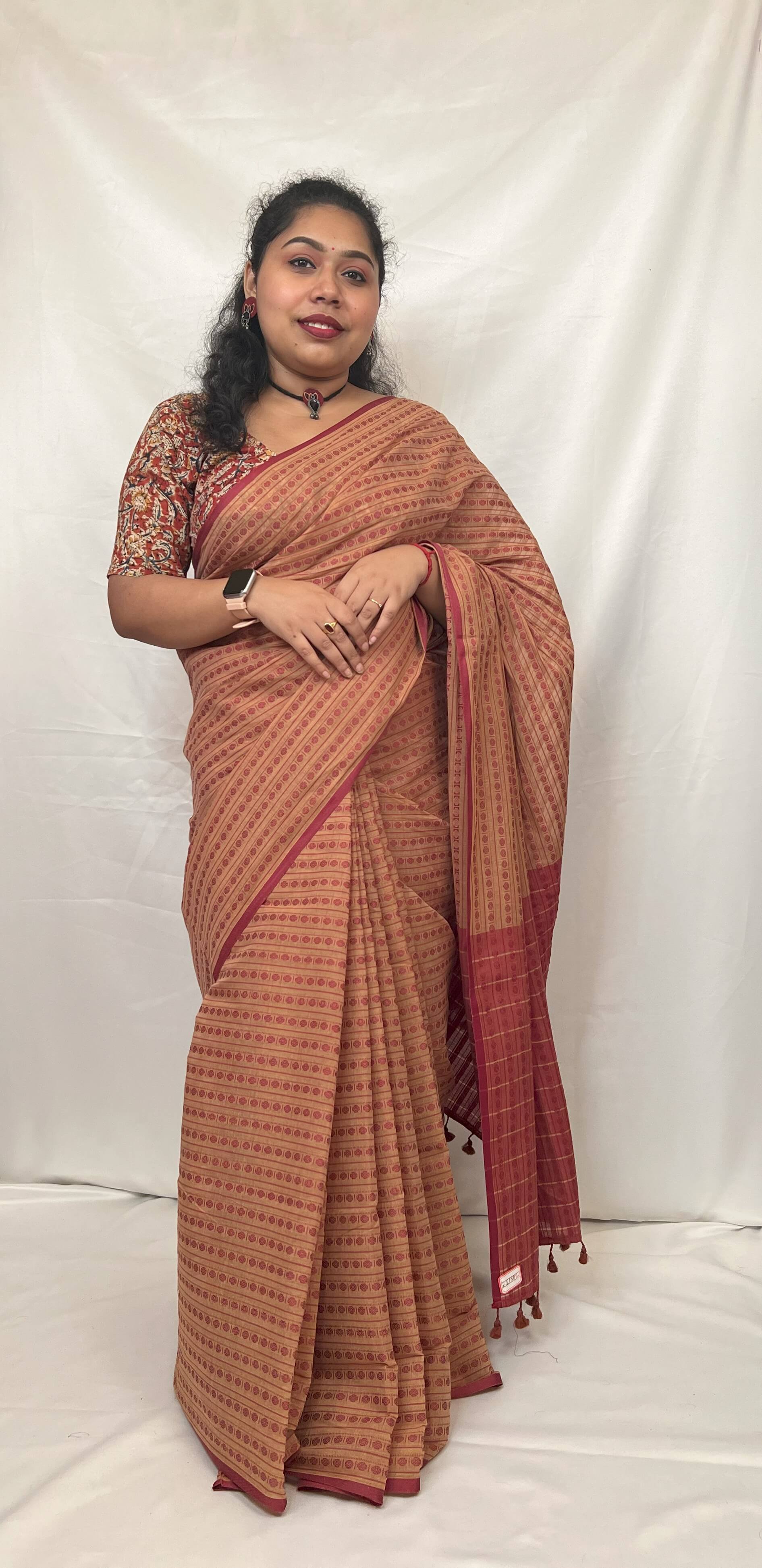 Lightweight beige handloom saree perfect for summer wear.