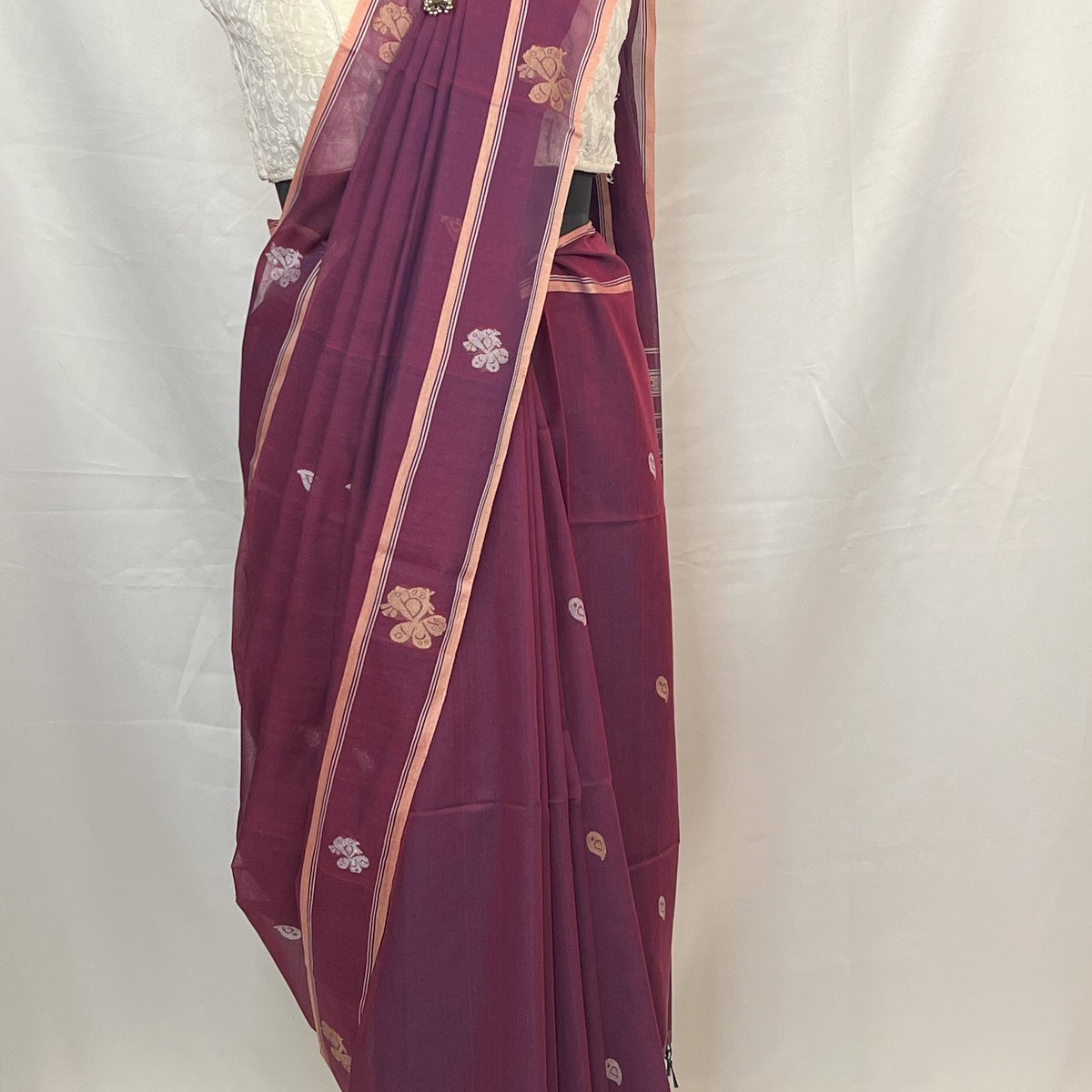 Authentic Bishnupur handloom Baluchari saree in peacock purple cotton fabric with fine weaving.