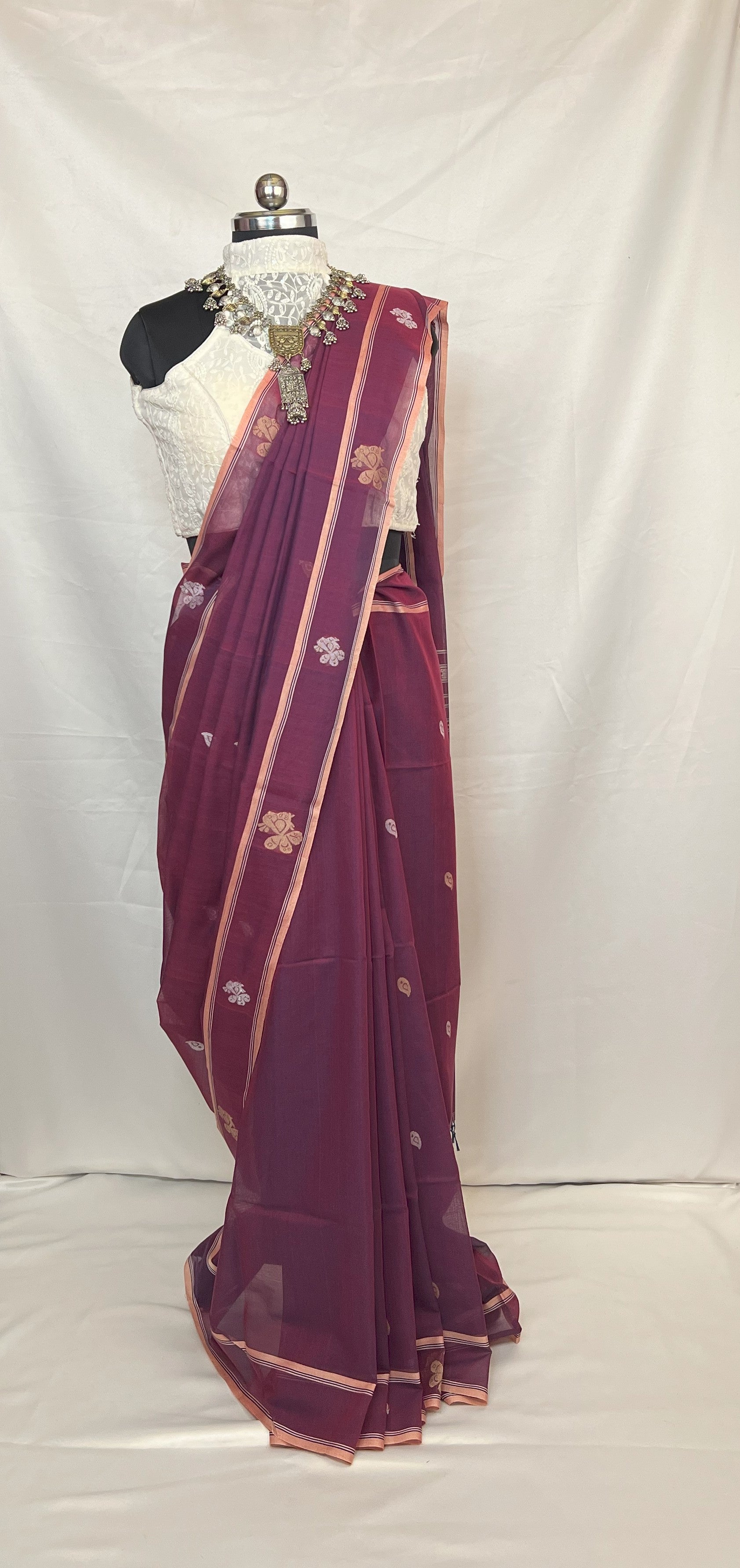 Authentic Bishnupur handloom Baluchari saree in peacock purple cotton fabric with fine weaving.