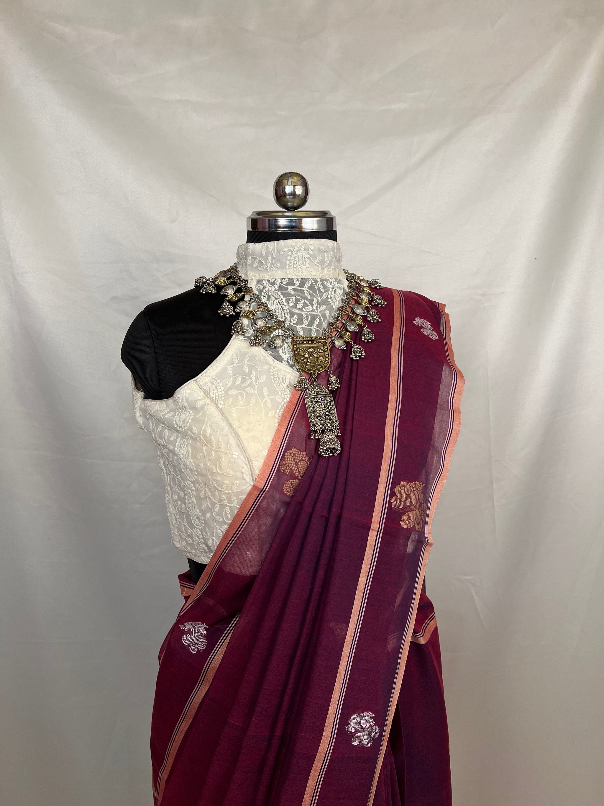 Elegant peacock purple handloom Baluchari saree in cotton, perfect for partywear and cultural events.