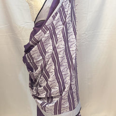Purple Handloom Baluchari Saree styled with contrast white embroidered blouse.