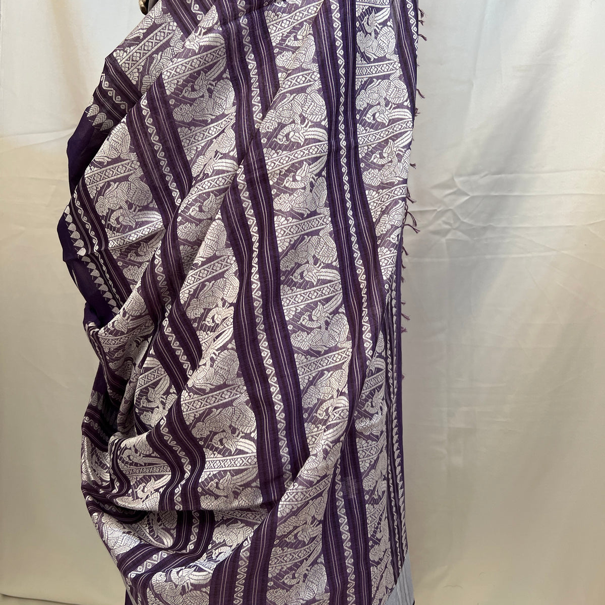 Close-up of delicate zari woven motifs on Purple Cotton Handloom Baluchari Saree.