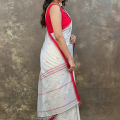 Side profile of woman wearing Red White Ash Handloom Saree – Elegant Cotton Saree for weddings