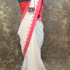 Bengali woman draped in Red White Saree inside Durga Puja pandal – Handloom festive wear