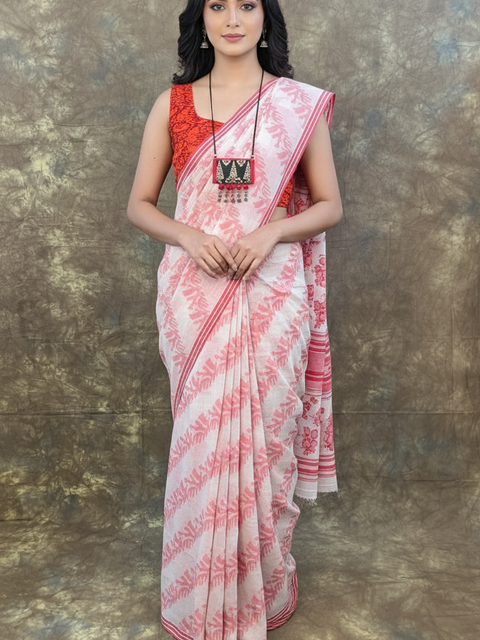 Red white handloom Bengali cotton saree for Durga Puja rituals.