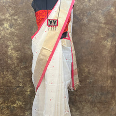 Side profile of model wearing Red White Linen Saree – Bengali Handloom Saree for festivals