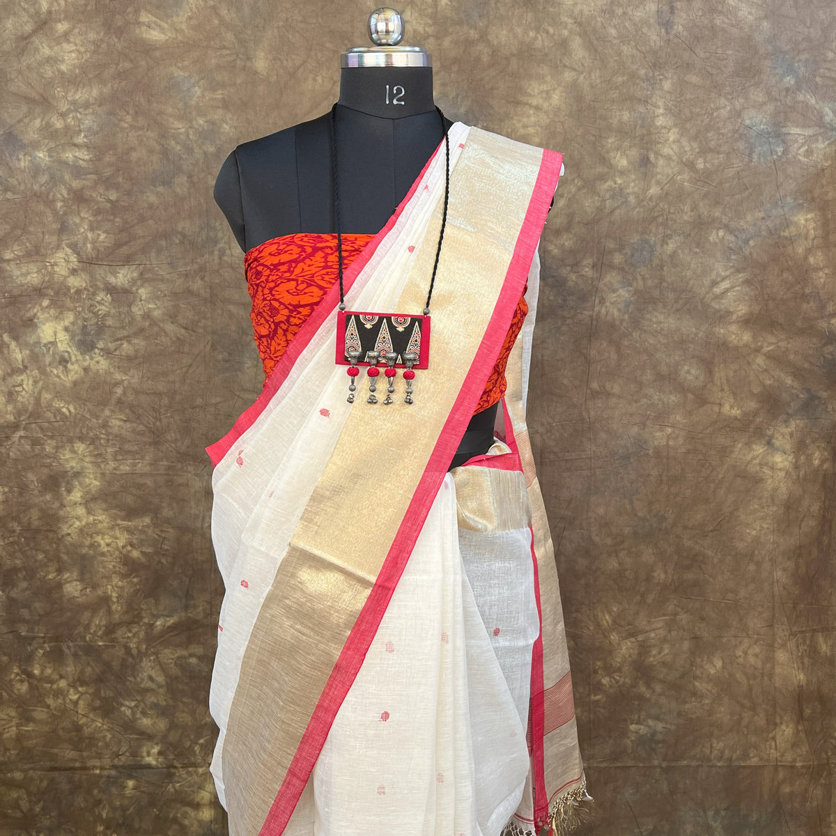 Red White Linen Saree styled for Durga Puja pandal hopping – Handloom Bengali saree by Vaarnali