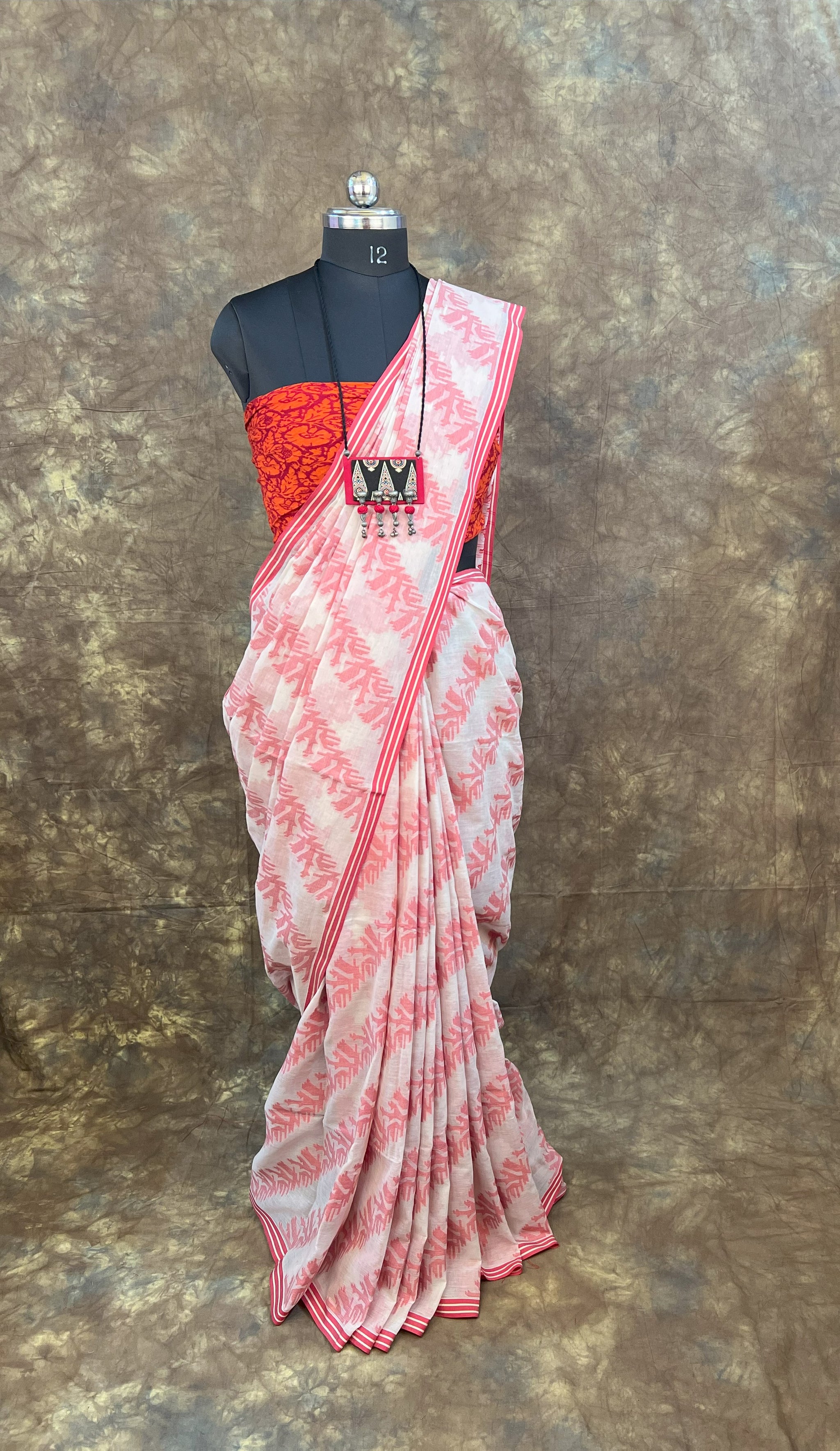 Red white cotton saree specially designed for Sindoor Khela rituals.