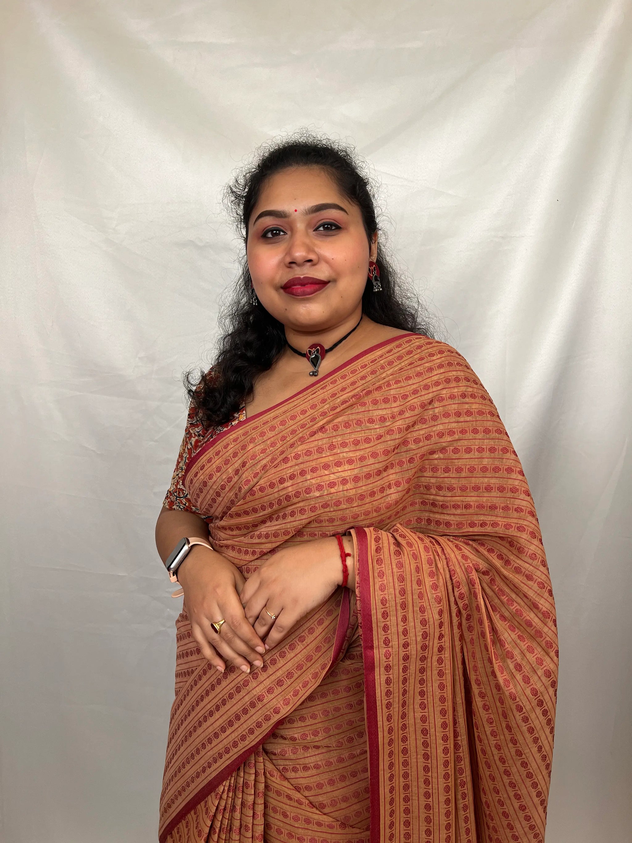 Model draping traditional Bengal handloom saree