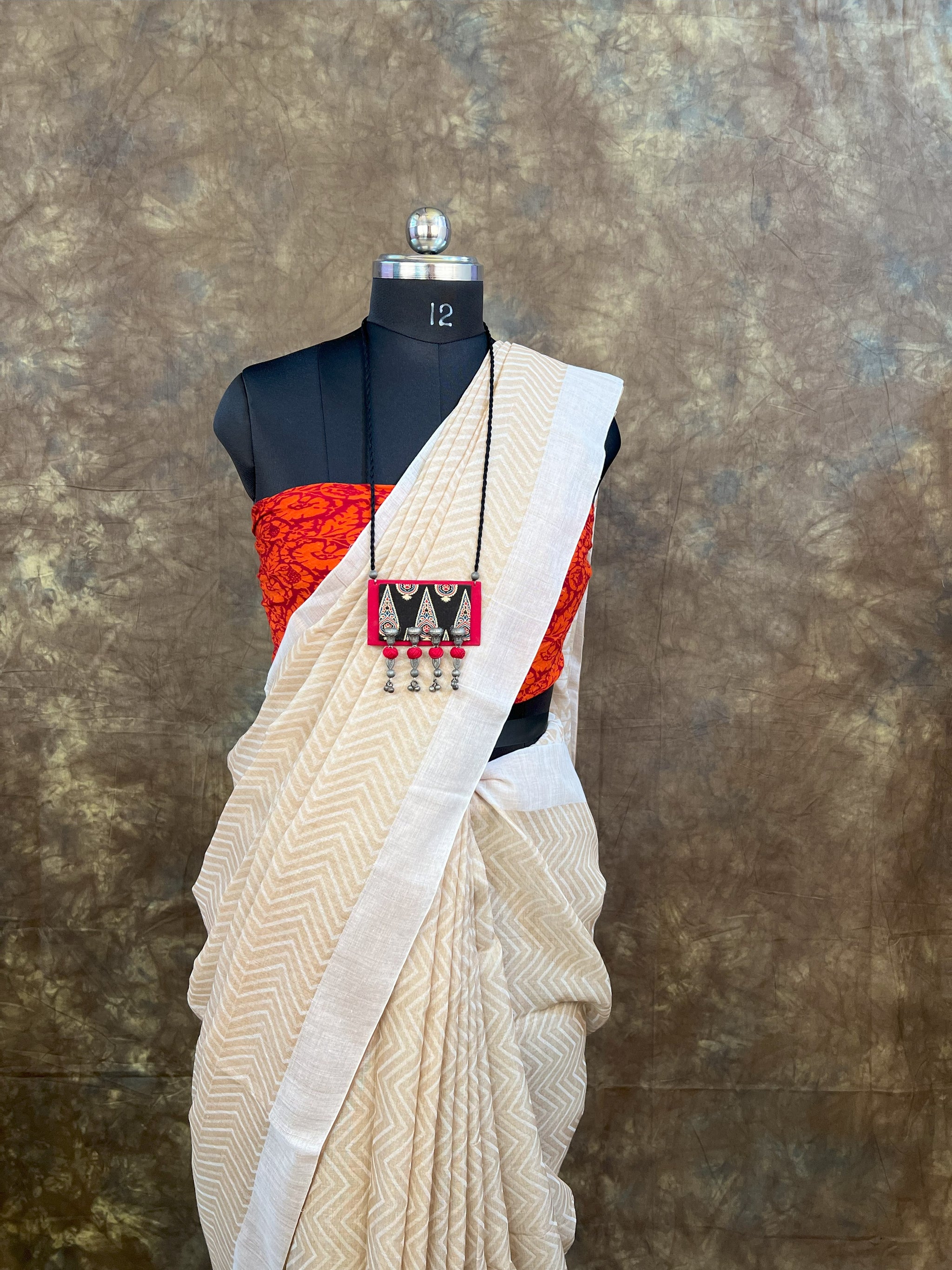 white tussar saree for Bengali wedding, handloom silk with festive design