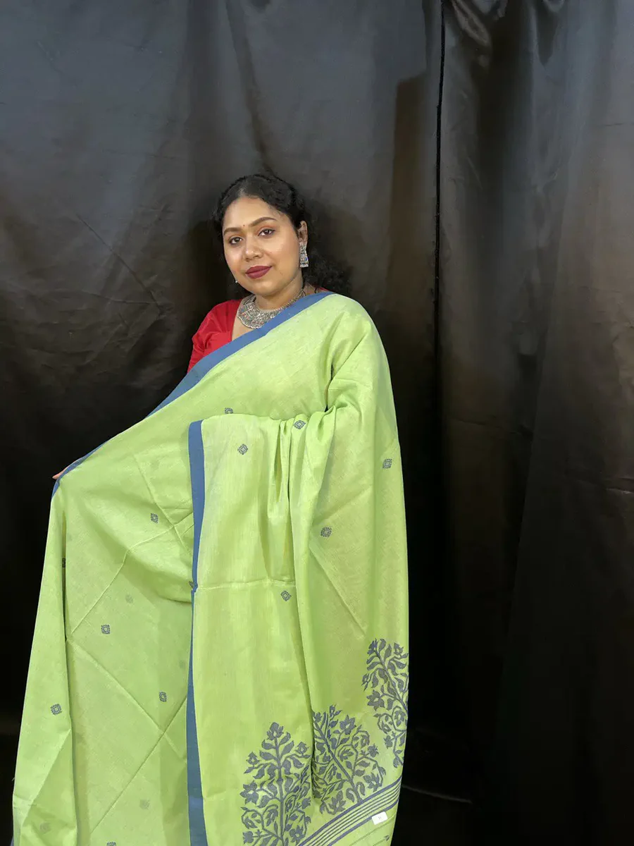photo_2025-08-13_11-18-52 Handloom Saree – Light Green Cotton Saree with Blue Border | Ethically Made - Image 1