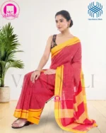 Woman posing in Patteda Anchu Red Cotton Saree with yellow border, traditional handloom design