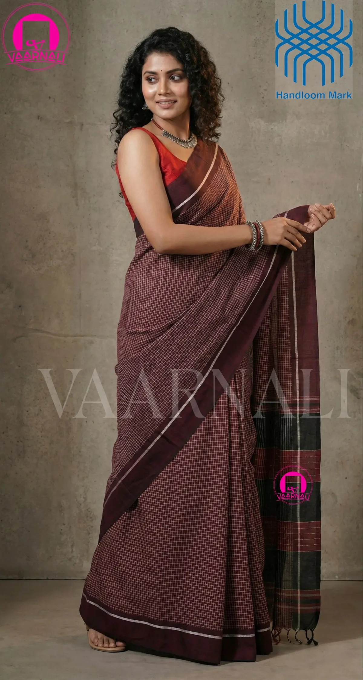Chocolate Patteda Anchu Saree flatlay with rich maroon striped handloom pattern