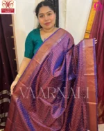 Close up of bindu buti motif weaving on purple Bishnupuri silk saree showing traditional jacquard work