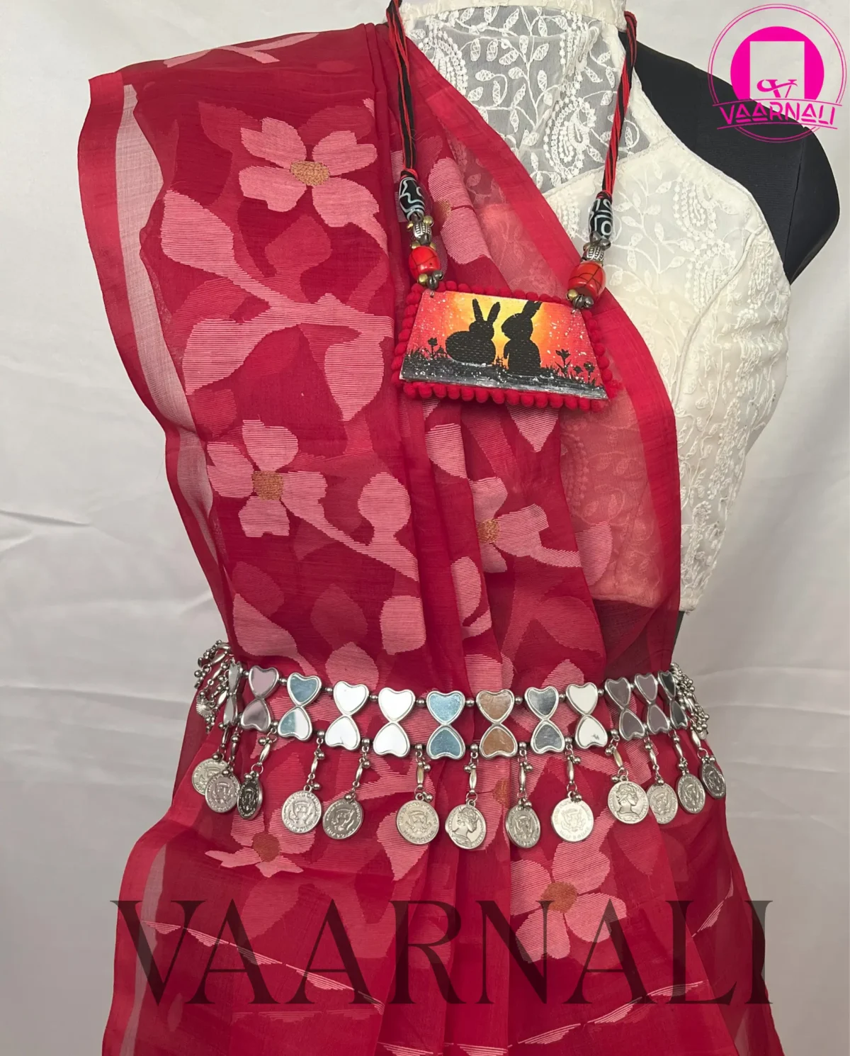 Flat lay of VAARNALI's untouched pure Red Muslin Saree, showcasing its full design and fine Muslin Cotton fabric for online viewing