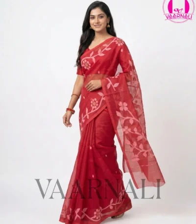 Model gracefully draped in VAARNALI's exquisite Red Muslin Saree, highlighting its sheer elegance and vibrant color.
