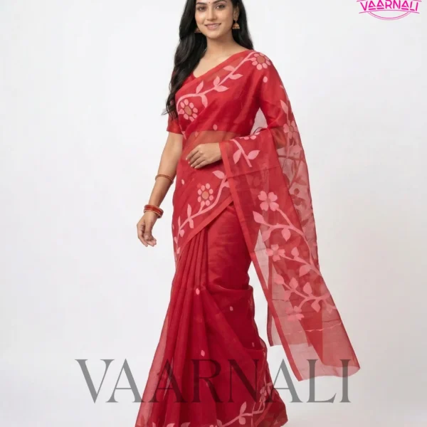 Model gracefully draped in VAARNALI's exquisite Red Muslin Saree, highlighting its sheer elegance and vibrant color.
